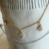 choker cadena con lunas oro y cristal