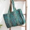 bolso de algodón en verde esmeralda y flores fucsias