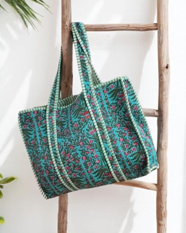 bolso de algodón en verde esmeralda y flores fucsias