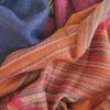 foulard de cashmere en color caldera y cenefa de rayas